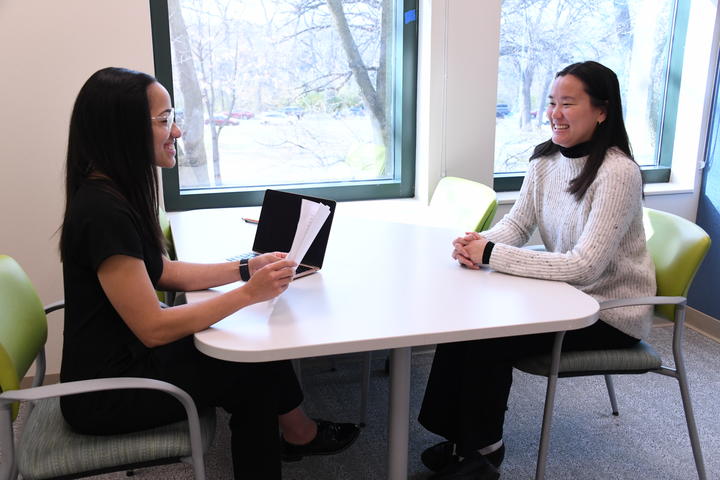 Research staff Michaelle DiMaggio-Potter and Josie Friedman modeling diagnostic interviews, which are commonly conducted in the RAD Lab